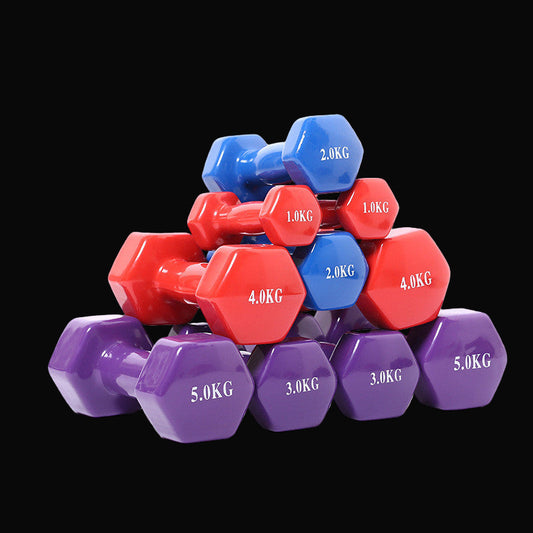 Color fitness dumbbells. Haltères de fitness colorés.